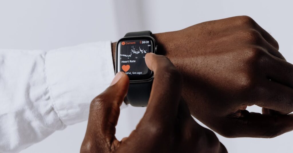 Close-up of a person interacting with a smartwatch for health tracking indoors.
